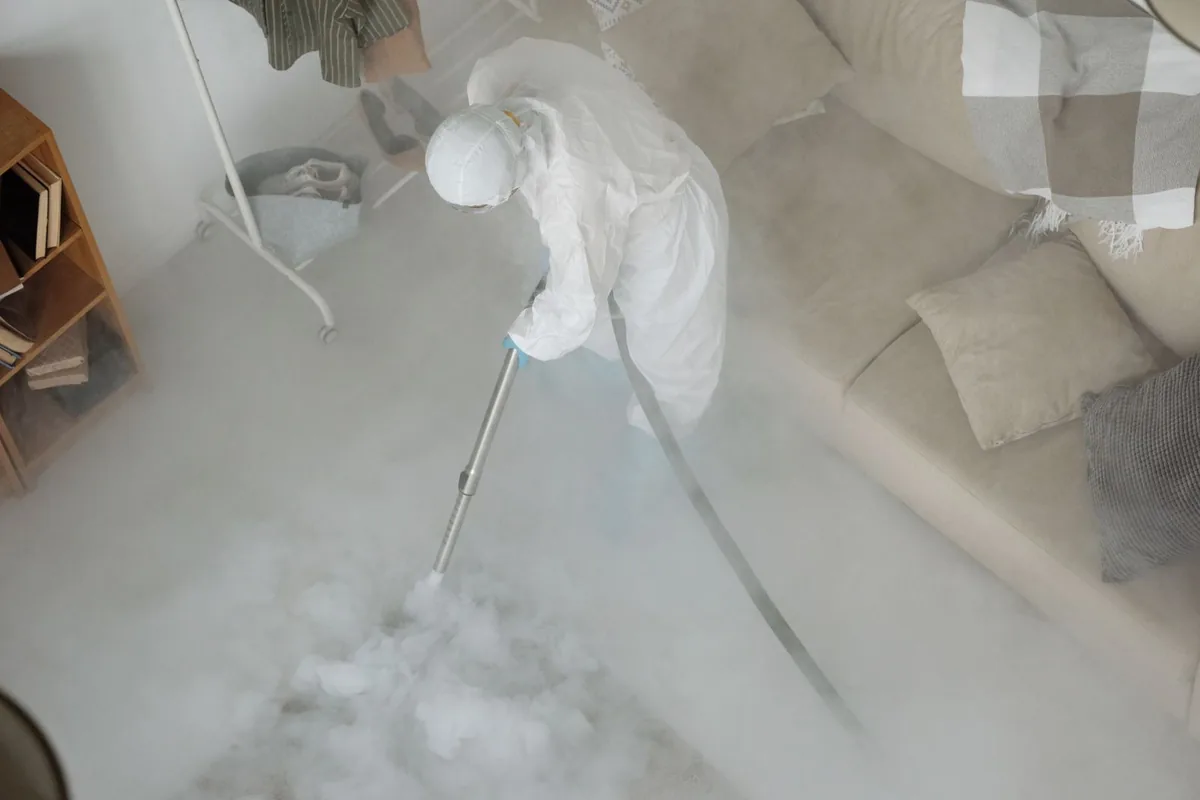 Biohazard cleanup technician in protective equipment, Frankfort, OH